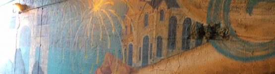 Wall painting of a bat and hands