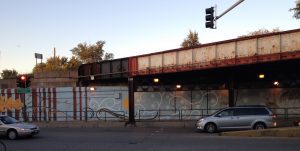 A car passing from under the bridge