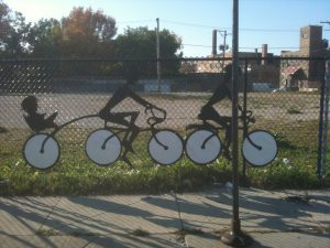 A bicycle fence mural