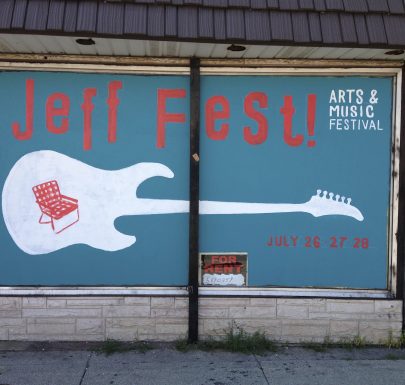 Guitar painting on a shop window