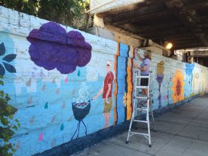 A blue cloud and man wall painting