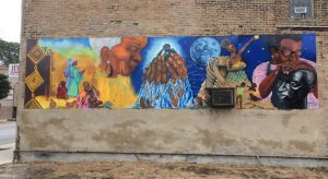 Women and hands painted on a wall