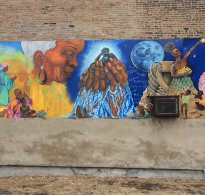 Women and hands painted on a wall