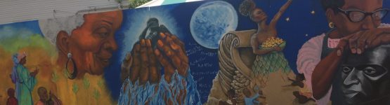 A mural painted on the side of a building.