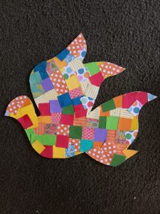 Dove bird made with colorful papers