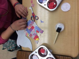 Kids making a colorful bird