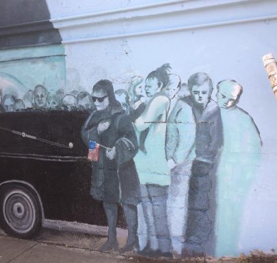 painting of 4 individuals looking at the car