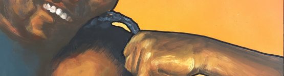 Couple painting on a wall