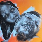 A grey wall painting of a couple