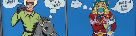 A comic-themed painting on a wall