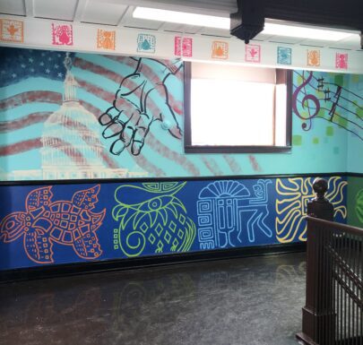 A wall painted with musical elements