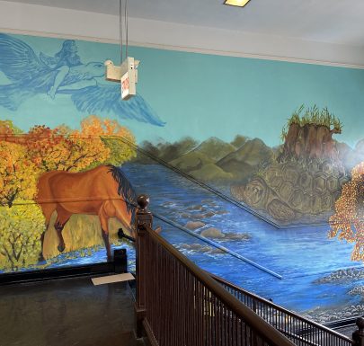 Staircase wall with a horse painting