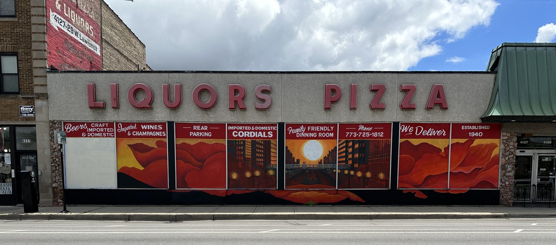 Storefront with "Liquors Pizza" signage.